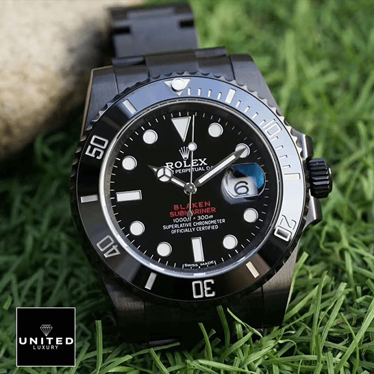 rolex_blaken_submariner_date_singel_red_black_dial_natural_front rolex_blaken_submariner_date_singel_red_black_dial_natural_front